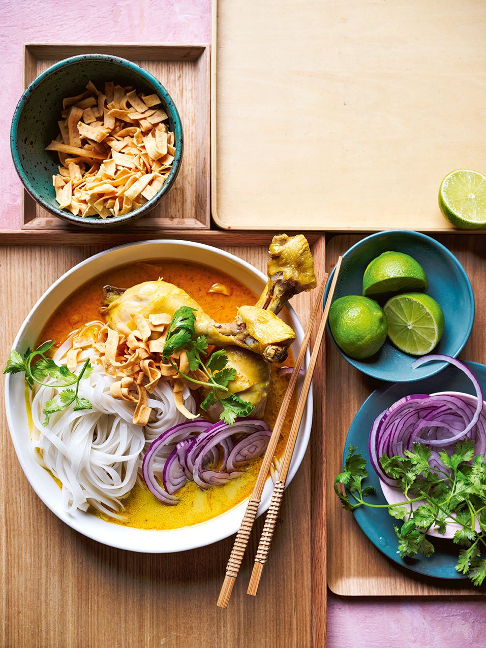Thai chicken khao soi with noodles, herbs and lime